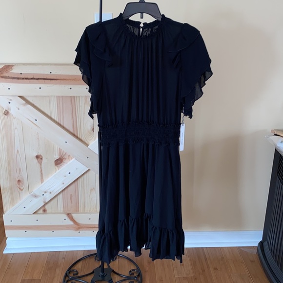 The Ruffle Smock Mini Dress
ICONS Objects of Devotion - Picture 7 of 9